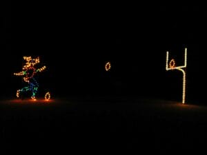 11' Animated Deer Playing Football Holiday Light Display