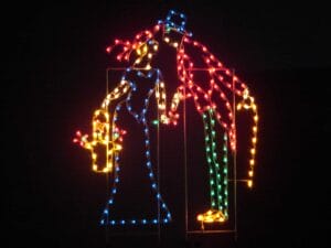 YULETIDE KISSING COUPLE